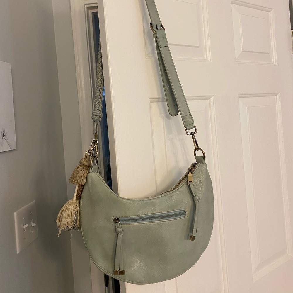 Anthropologie leather Half-Moon Tasseled Crossbody Bag by Urban Originals